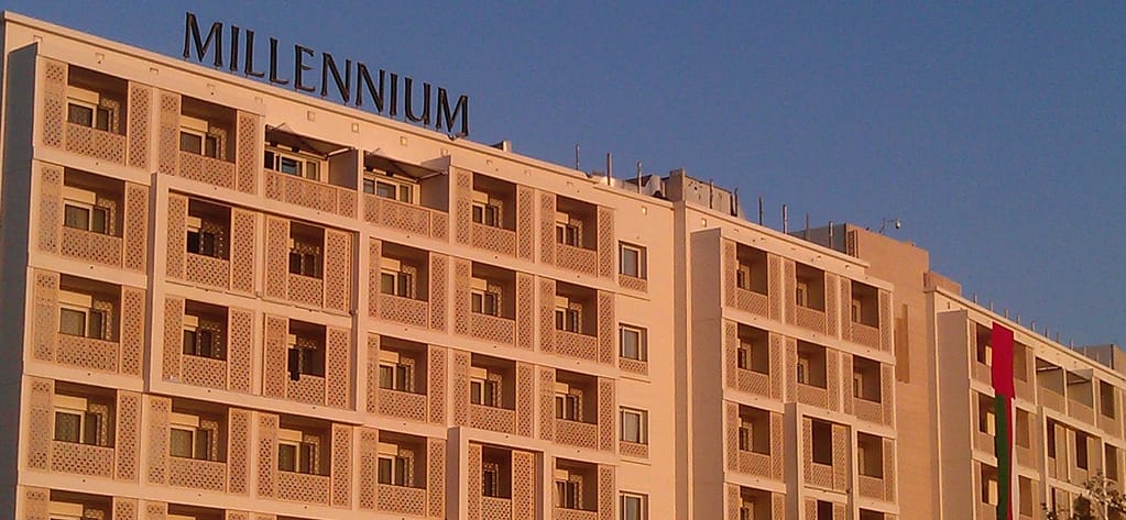 Millennium resort with the Omani flag draped for National Day.