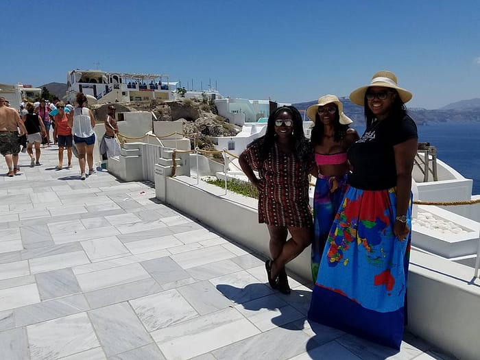 Angela (center) with iluv2globetrot Co-Founders Nicole and Renee in Greece.